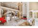 Open-concept living area with a fireplace and staircase at 720 Heards Ferry Rd, Sandy Springs, GA 30328
