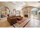 Elegant living room featuring arched doorways and a cozy fireplace at 720 Heards Ferry Rd, Sandy Springs, GA 30328
