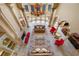Living room with large windows, high ceilings, and a decorative chandelier at 720 Heards Ferry Rd, Sandy Springs, GA 30328