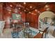 Warm and inviting home office with wood paneling, custom bookshelves, and fireplace at 720 Heards Ferry Rd, Sandy Springs, GA 30328
