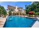 Large swimming pool with fountain features and ample lounge seating at 720 Heards Ferry Rd, Sandy Springs, GA 30328