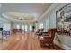 Spacious recreation room with hard wood floors, recessed lighting, and doors that lead to the backyard at 720 Heards Ferry Rd, Sandy Springs, GA 30328
