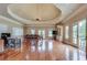 Spacious recreation room with hard wood floors, recessed lighting, and doors that lead to the backyard at 720 Heards Ferry Rd, Sandy Springs, GA 30328