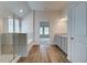 Spacious bathroom featuring a tiled shower, soaking tub, and double vanity at 1816 Kingsmere Run Dr, Loganville, GA 30052