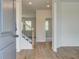 Inviting foyer with hardwood floors, staircase and views into other rooms at 1816 Kingsmere Run Dr, Loganville, GA 30052