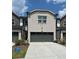 Brick exterior with a two-car garage and well-maintained landscaping at 2670 Greenbelt Rd, Snellville, GA 30078