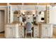 Bathroom vanity features marble countertop, dual sinks, and a chair for makeup at 450 Dorset Sw Way, Smyrna, GA 30082