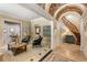 Inviting foyer with tiled floors, arched ceiling, and views of the staircase at 450 Dorset Sw Way, Smyrna, GA 30082