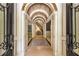 Grand foyer showcasing unique ceiling, arched doorways, and elegant staircase at 450 Dorset Sw Way, Smyrna, GA 30082