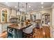 Spacious kitchen with large center island and breakfast bar, complete with professional grade appliances and hardwood floors at 450 Dorset Sw Way, Smyrna, GA 30082