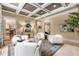 Spacious living room area with coffered ceilings and many comfortable seating options and views to other living spaces at 450 Dorset Sw Way, Smyrna, GA 30082