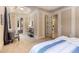 Bright main bedroom with sitting area, tray ceilings, and natural light, creating a luxurious retreat at 450 Dorset Sw Way, Smyrna, GA 30082