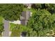 An aerial view of the property, with lush green landscaping at 11660 Windbrooke Way, Johns Creek, GA 30005