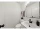 Modern half bath featuring updated fixtures and decor at 11660 Windbrooke Way, Johns Creek, GA 30005