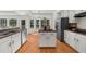 Bright kitchen with lots of natural light and a central island area, stainless steel appliances, eat-in kitchen at 11660 Windbrooke Way, Johns Creek, GA 30005