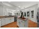 Open concept kitchen and breakfast nook area filled with plenty of natural light and eat in dining at 11660 Windbrooke Way, Johns Creek, GA 30005
