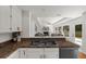 Cozy kitchen with open layout into the living area, and well lit from natural light coming from the bay window at 11660 Windbrooke Way, Johns Creek, GA 30005