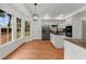 Eat-in kitchen features large windows and stainless steel appliances at 11660 Windbrooke Way, Johns Creek, GA 30005