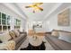 Spacious living room with plenty of natural light at 11660 Windbrooke Way, Johns Creek, GA 30005