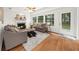 Comfortable living room featuring neutral tones and fireplace at 11660 Windbrooke Way, Johns Creek, GA 30005