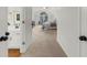 Carpeted main bedroom suite with sitting area, vaulted ceilings and ensuite bathroom at 11660 Windbrooke Way, Johns Creek, GA 30005