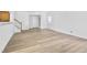 Spacious living room with hardwood floors and neutral walls at 2468 Whistle Stop Dr, Norcross, GA 30071