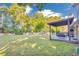Expansive backyard with a covered patio, perfect for outdoor entertaining and relaxation at 3568 Foxworth Ct, Buford, GA 30519