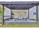 Outdoor patio area with modern seating, providing a comfortable space for relaxation and gatherings at 3568 Foxworth Ct, Buford, GA 30519