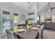 Dining area showcasing table with place settings and view of the backyard through double doors at 3568 Foxworth Ct, Buford, GA 30519