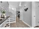 Spacious foyer with staircase, wood floors and access to other areas of the home at 3568 Foxworth Ct, Buford, GA 30519