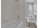 Bright bathroom features a shower and tiled floors at 5696 Kilrush Se Ct, Mableton, GA 30126