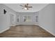 Cozy bedroom with hardwood floors, natural light, and a ceiling fan at 5696 Kilrush Se Ct, Mableton, GA 30126