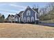Beautiful two-story home with well-manicured lawn, complementing the traditional architectural design at 5696 Kilrush Se Ct, Mableton, GA 30126