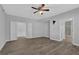 Spacious main bedroom with hardwood floors, ceiling fan, and ensuite bathroom at 5696 Kilrush Se Ct, Mableton, GA 30126
