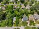 Aerial view of a neighborhood with tree-lined streets and well-maintained homes at 2355 Ewing Ne Dr, Brookhaven, GA 30319