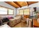 Compact bedroom featuring sloped ceilings, natural light, and traditional furnishings at 2355 Ewing Ne Dr, Brookhaven, GA 30319