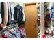 Walk-in closet with ample storage space and organized shelving for clothing and accessories at 2355 Ewing Ne Dr, Brookhaven, GA 30319