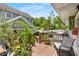 Exterior view of an outdoor deck with seating and greenery; a nice spot to relax at 2355 Ewing Ne Dr, Brookhaven, GA 30319