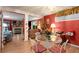 Eat-in dining area features a glass table with four chairs, and connects to the living room at 2355 Ewing Ne Dr, Brookhaven, GA 30319