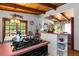 Charming kitchen with a view into the dining room, showcasing warm wood accents and natural light at 2355 Ewing Ne Dr, Brookhaven, GA 30319