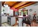 Bright kitchen with red countertops, wood accents, and a view into the dining area at 2355 Ewing Ne Dr, Brookhaven, GA 30319