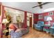 Comfortable living room featuring hardwood flooring and a ceiling fan at 2355 Ewing Ne Dr, Brookhaven, GA 30319