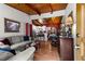 Inviting living room with a wood-beamed ceiling and dining area at 2355 Ewing Ne Dr, Brookhaven, GA 30319