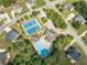 Overhead shot of neighborhood amenities including a pool, tennis courts, and clubhouse at 3202 Lucky Pl, Conyers, GA 30013