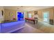 Spacious basement area with pool table, bar, and an entertainment area perfect for gatherings at 3202 Lucky Pl, Conyers, GA 30013