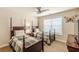 This is a bedroom featuring two beds with plaid comforters and wooden frames at 3202 Lucky Pl, Conyers, GA 30013