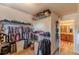 Spacious walk-in closet with ample storage and a view of the adjacent bathroom at 3202 Lucky Pl, Conyers, GA 30013