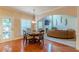 Cozy dining area featuring a hardwood floors, and view of the living room at 3202 Lucky Pl, Conyers, GA 30013
