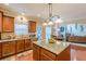 Spacious kitchen featuring an island, stainless steel appliances, and granite countertops at 3202 Lucky Pl, Conyers, GA 30013
