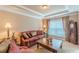 Comfortable living room with natural light, traditional furniture, and decorative accents at 3202 Lucky Pl, Conyers, GA 30013